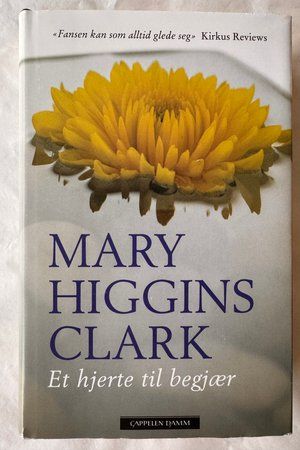 Et hjerte til begjær av Mary Higgins Clark - Forside
