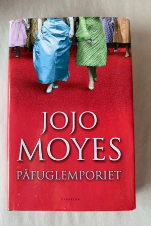 Påfuglemporiet av Jojo Moyes - Forside