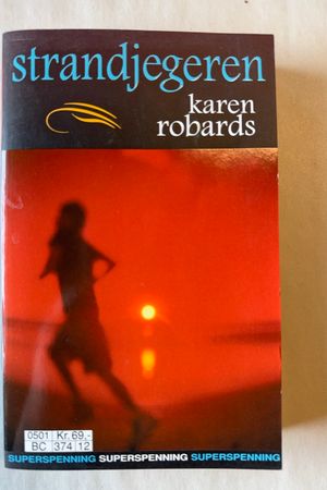 Strandjegeren av Karen Robards - Forside