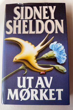 Ut av mørket av Sidney Sheldon - Forside